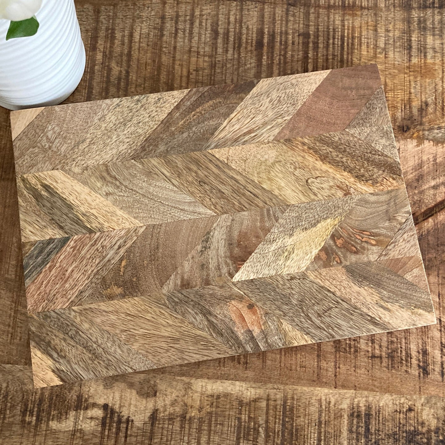 Set of solid Mango wood Parquet placemats single close up