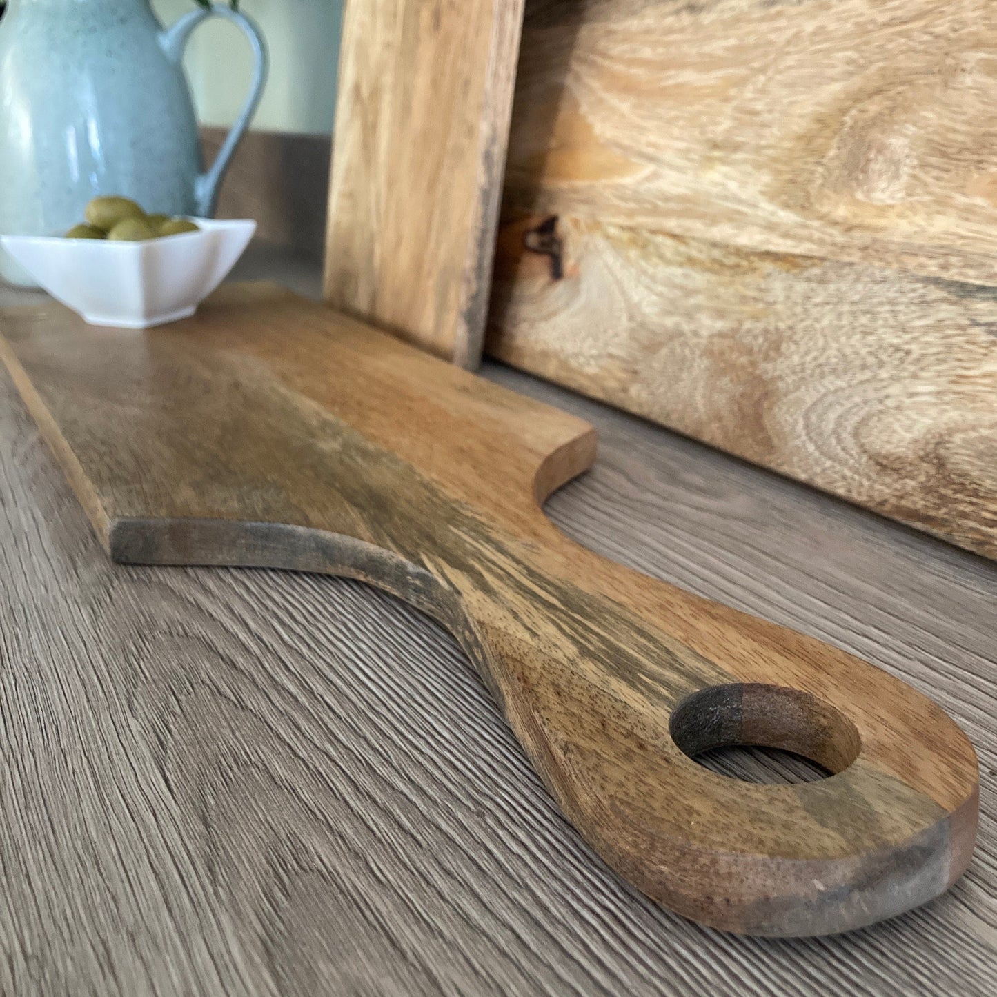 Mango wood loop handled paddle boards close up