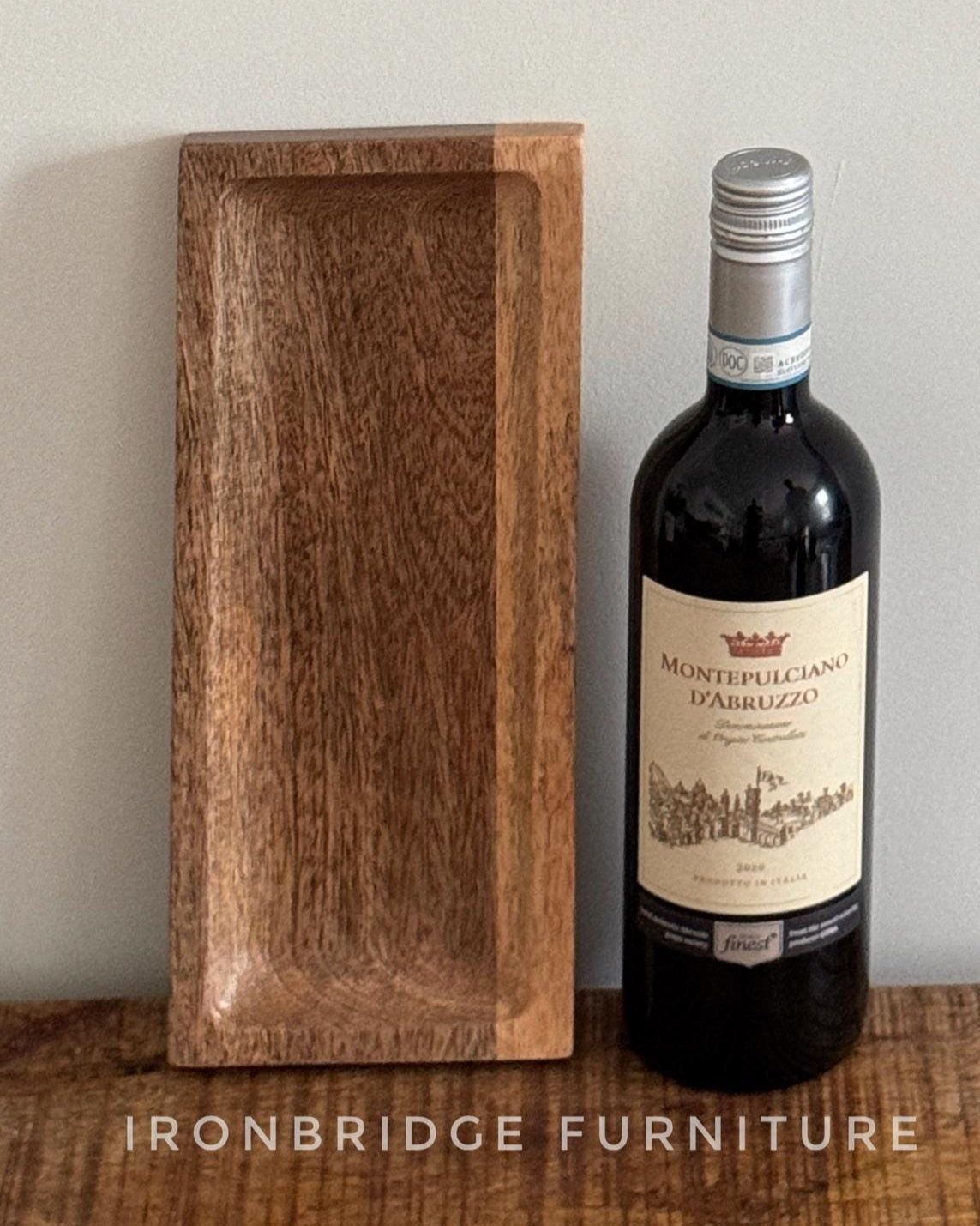 Slim Mango wood condiment tray. Shown with a bottle of wine.
