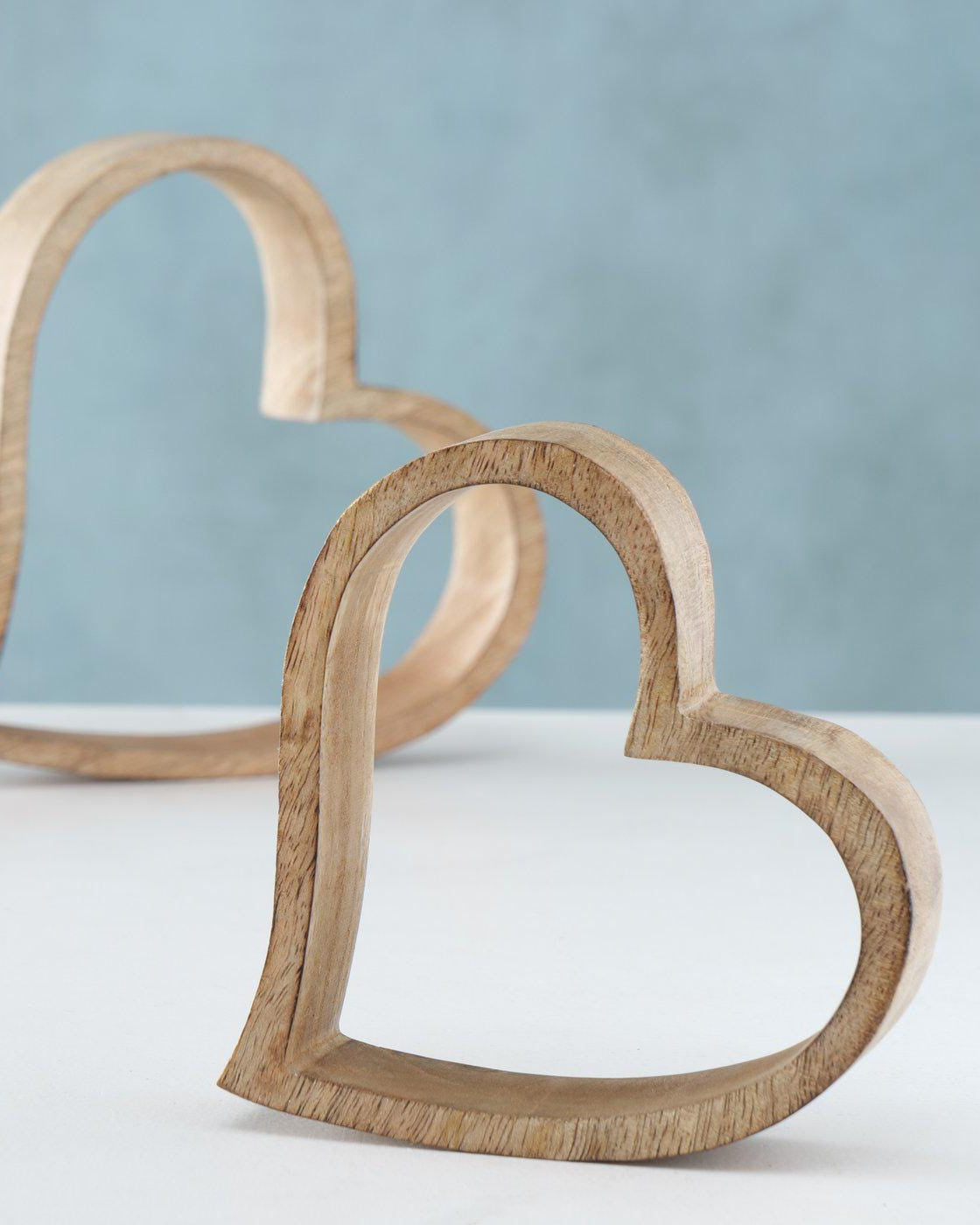 Set of 2 Rustic rough cut Mango wood hearts on a white background