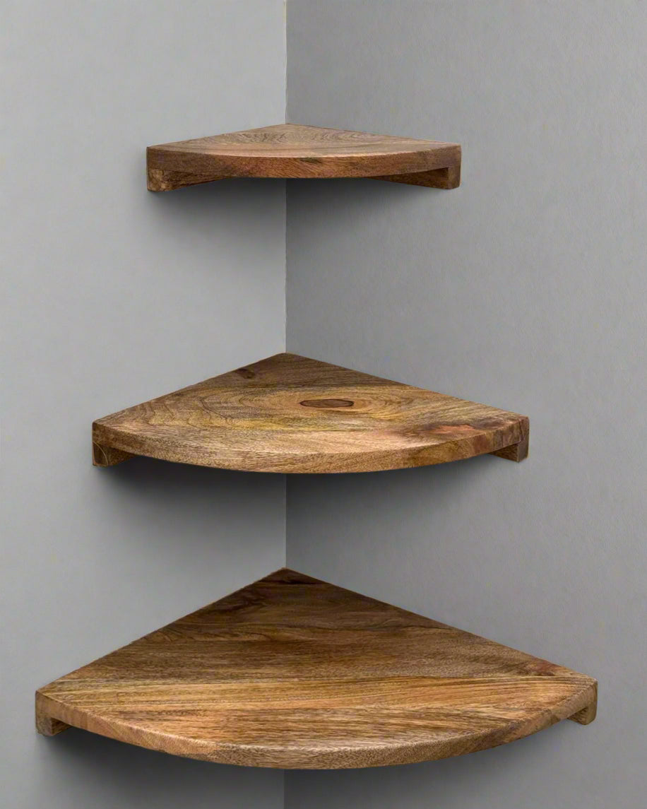 Set of 3 Mango wood rounded corner wall shelves. Shelves mounted on the wall.