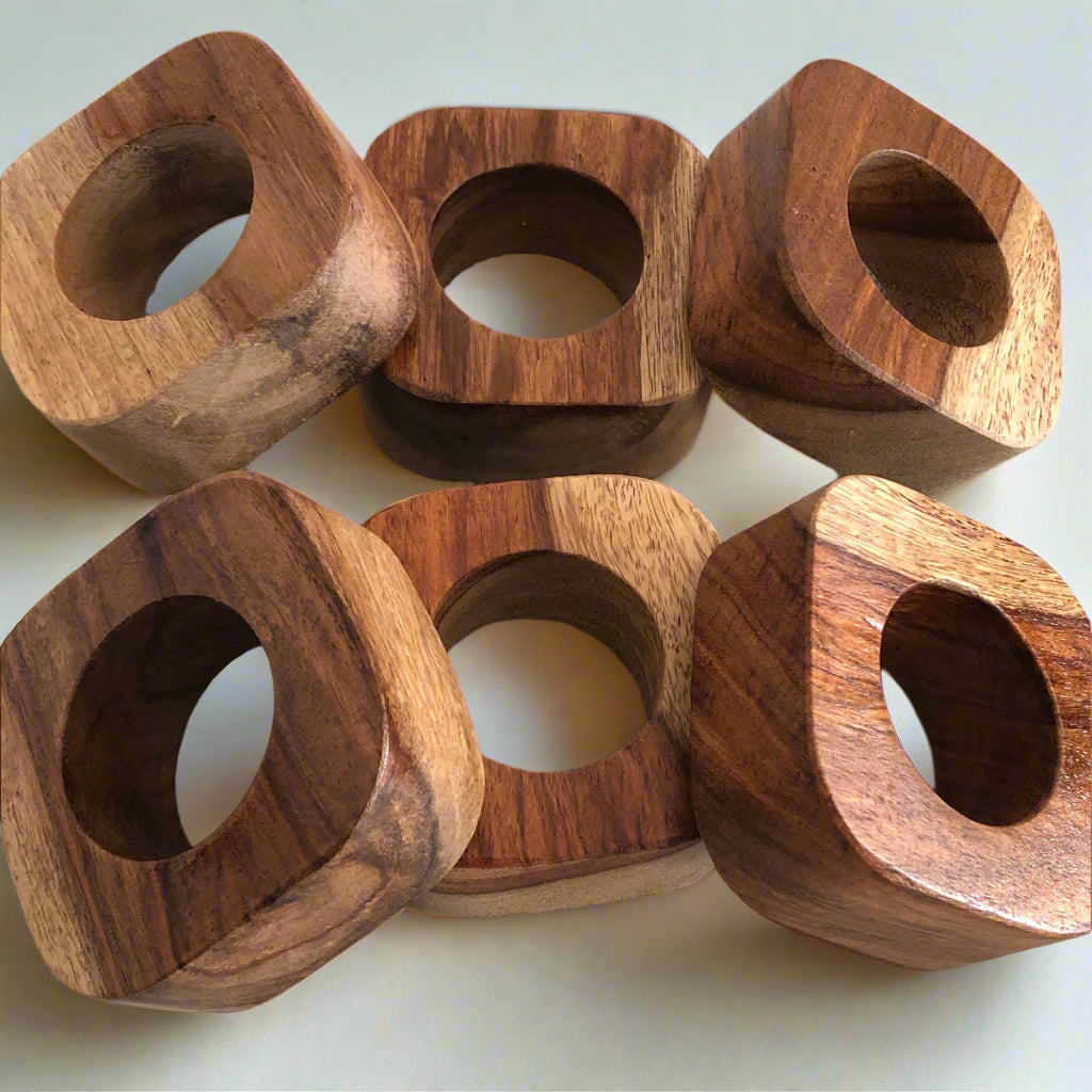 Set of solid Sheesham wood napkin rings - 6 rings shown.