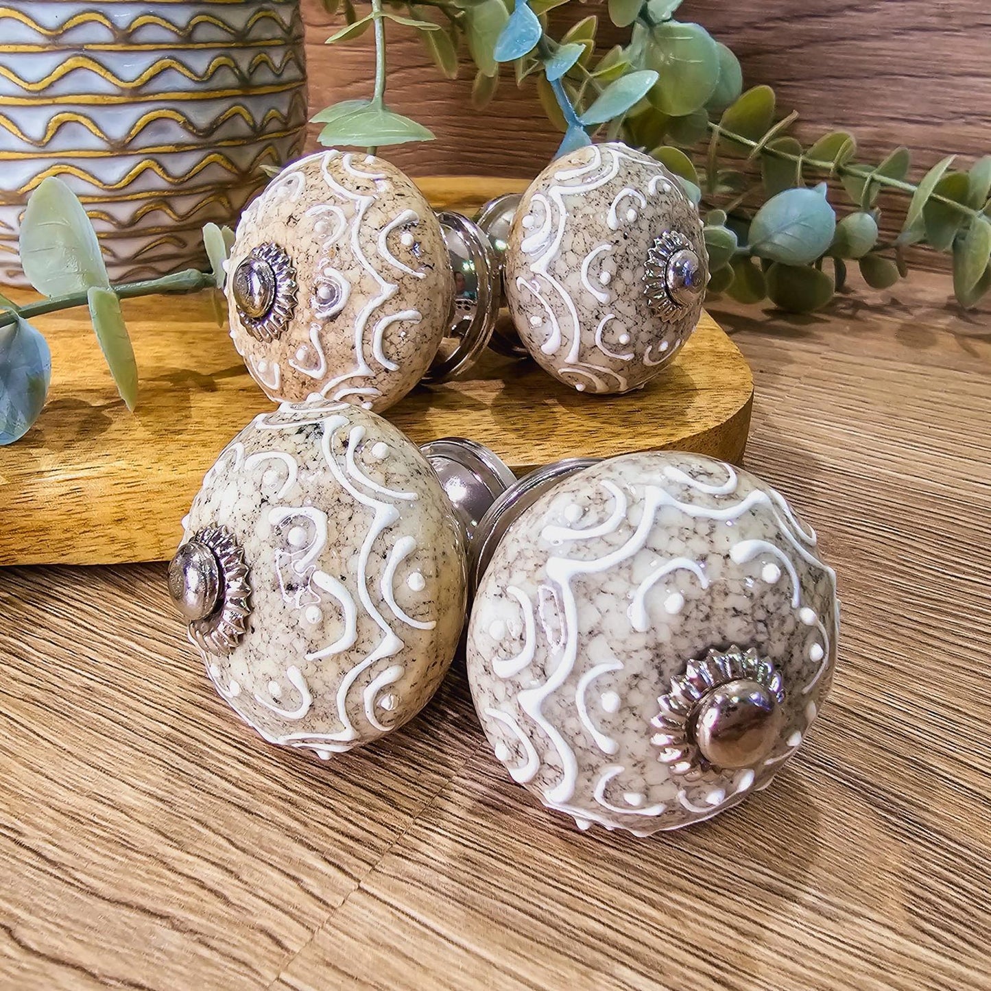 Set of 4 hand painted ceramic knob handles. 6 neutral colour designs. Design E