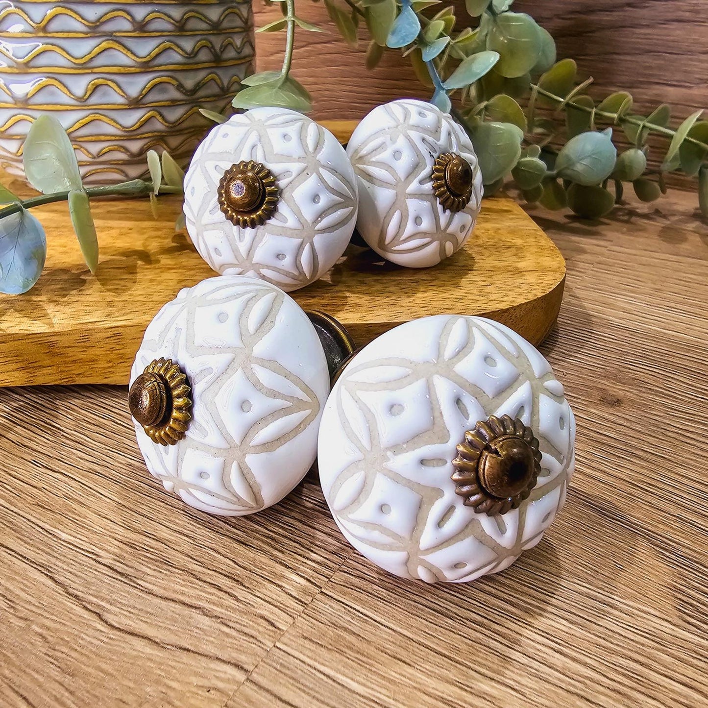 Set of 4 hand painted ceramic knob handles. 6 neutral colour designs. Design F