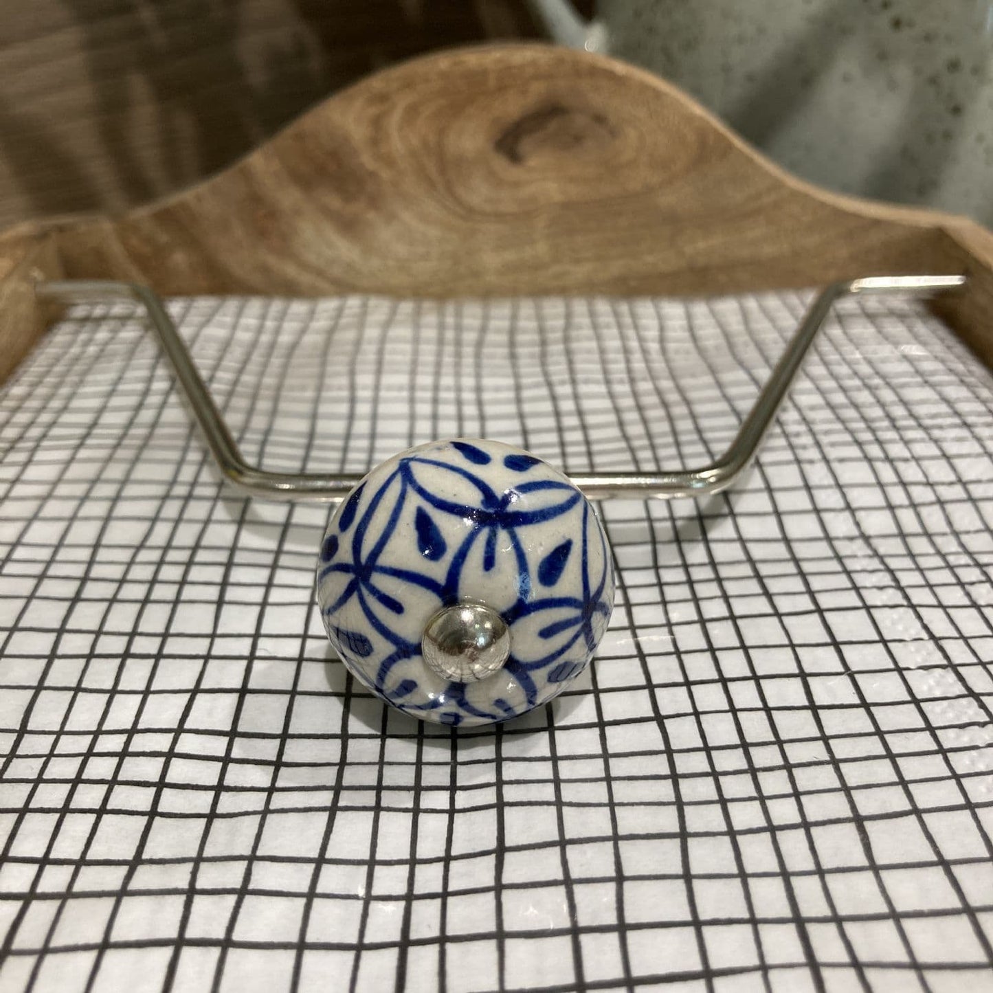 Mango wood napkin holder with ceramic knob weight - close up of knob