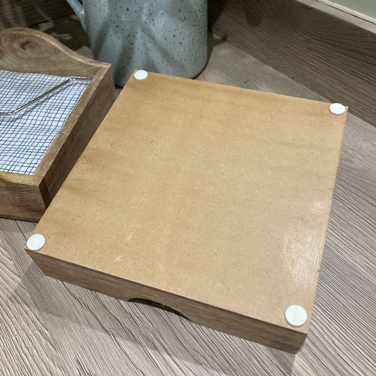 Mango wood napkin holder with ceramic knob weight - underneath