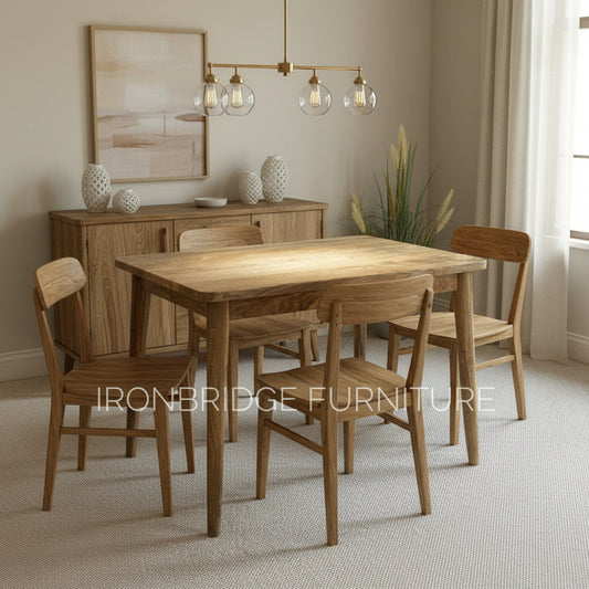 Wooden table on a carpeted floor with 'Ironbridge Furniture' branding.