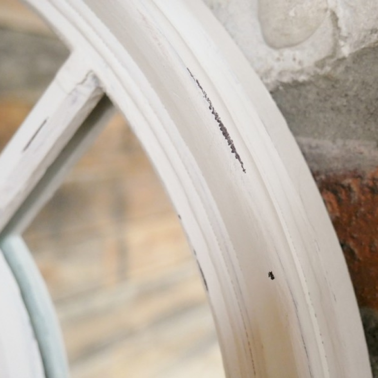Close-up of a bicycle wheel with a blurred background