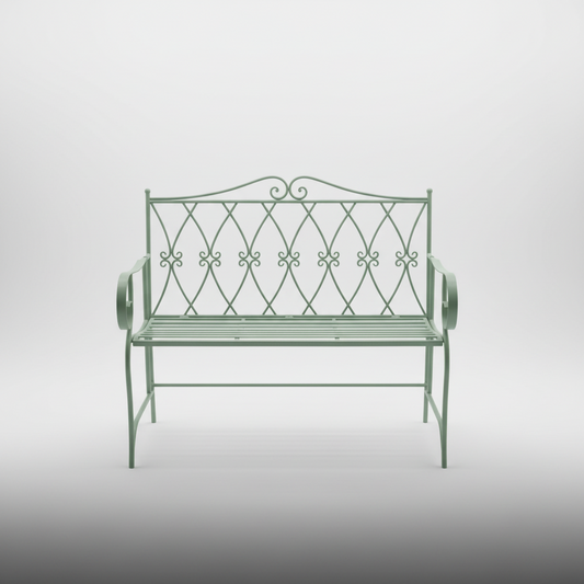 Decorative metal garden bench on a grassy background