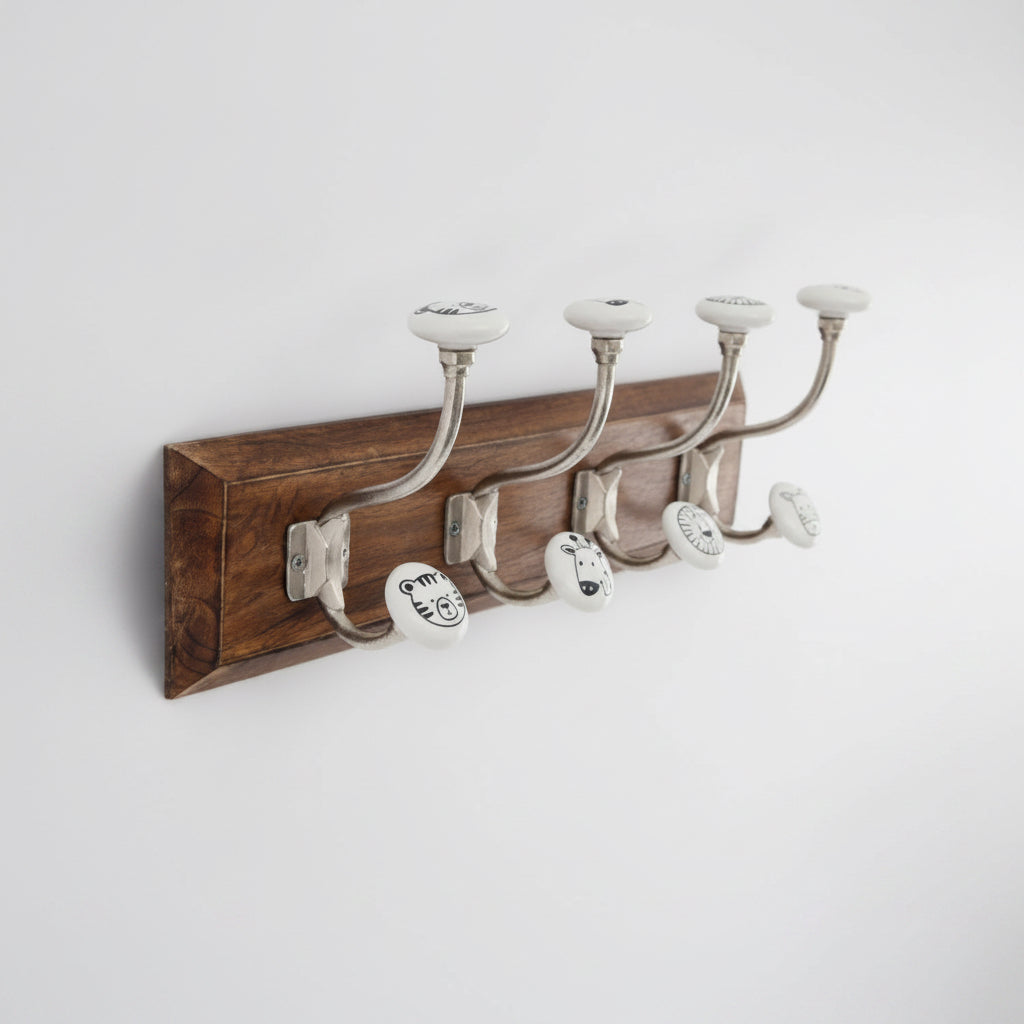 Wooden coat rack with five hooks on a white background