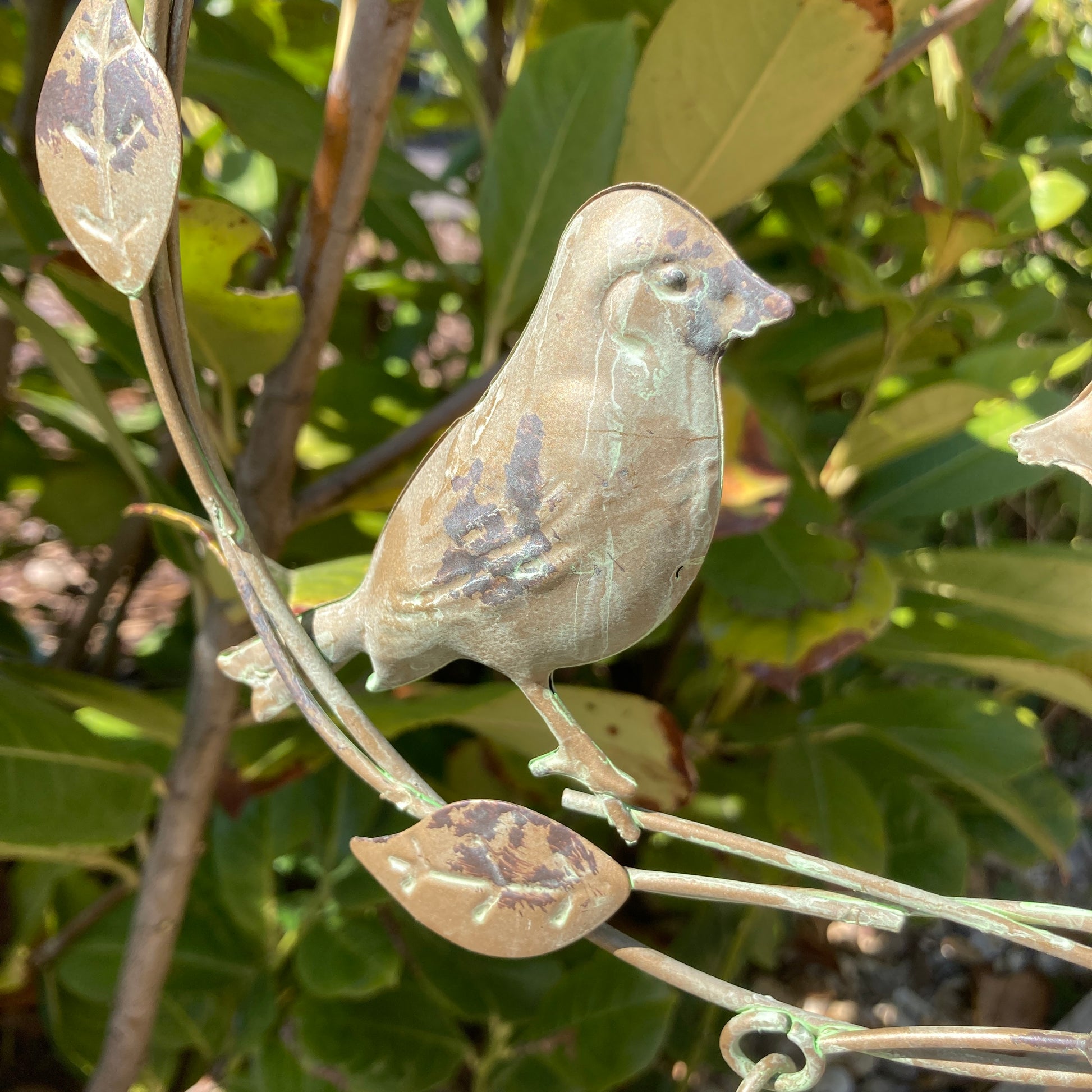 Hanging bird wind chime / bell. Close up of a bird. 