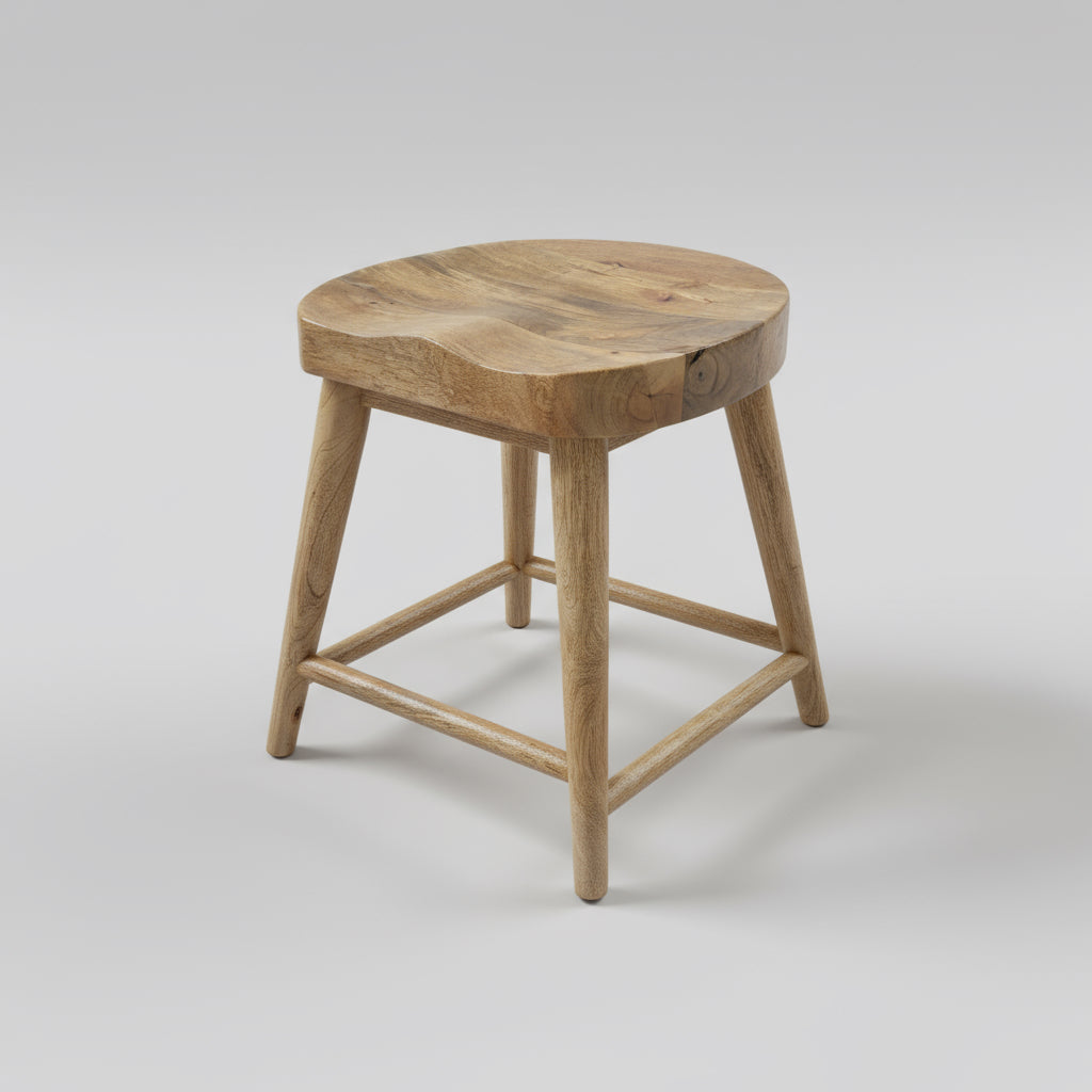Wooden stool on a wooden floor with a neutral wall background