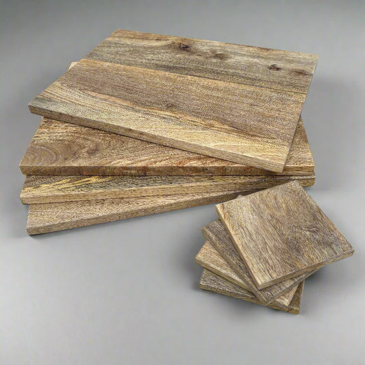 Stack of wooden planks on a gray background