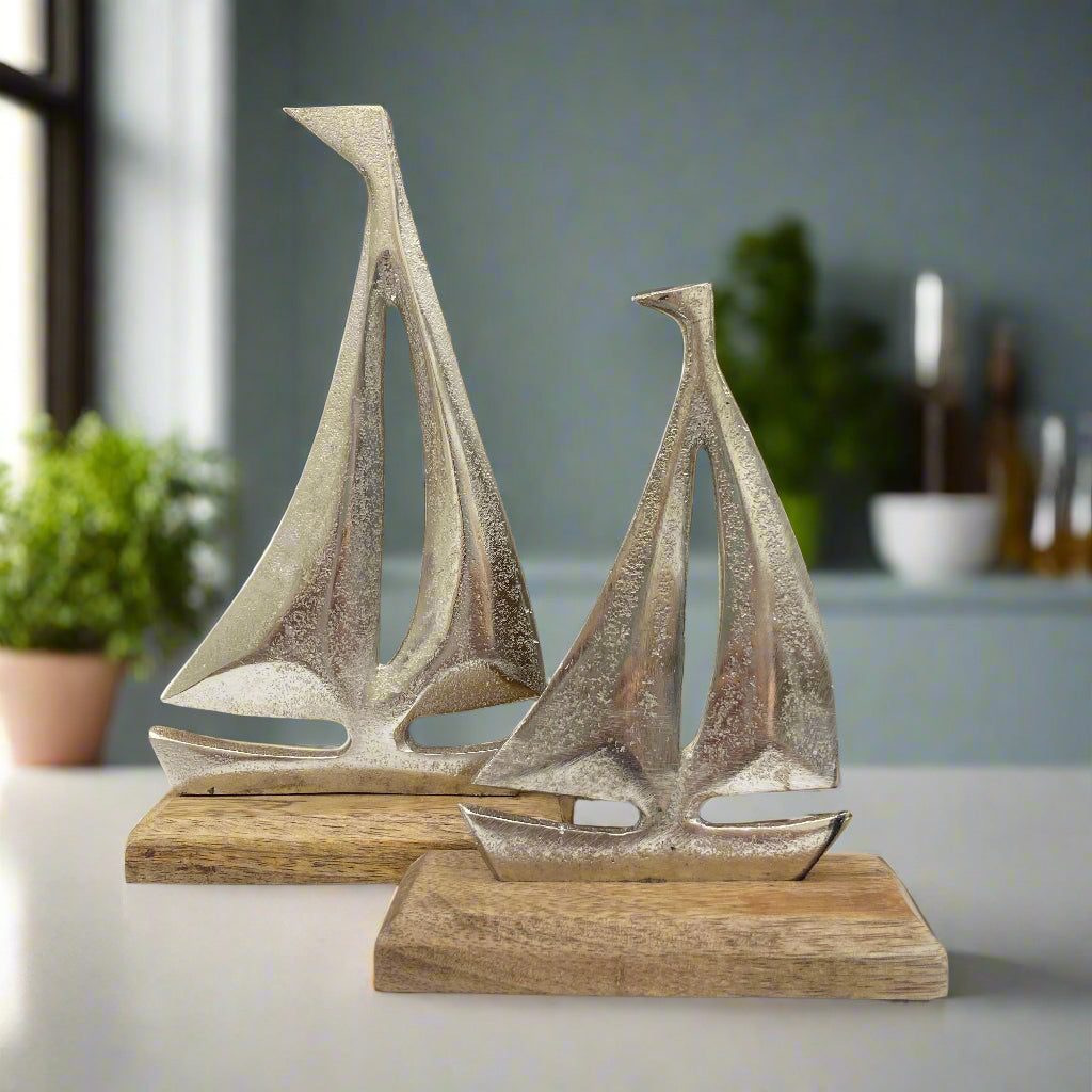 Cast aluminium sailing yachts on Mango wood base. 2 sizes available
