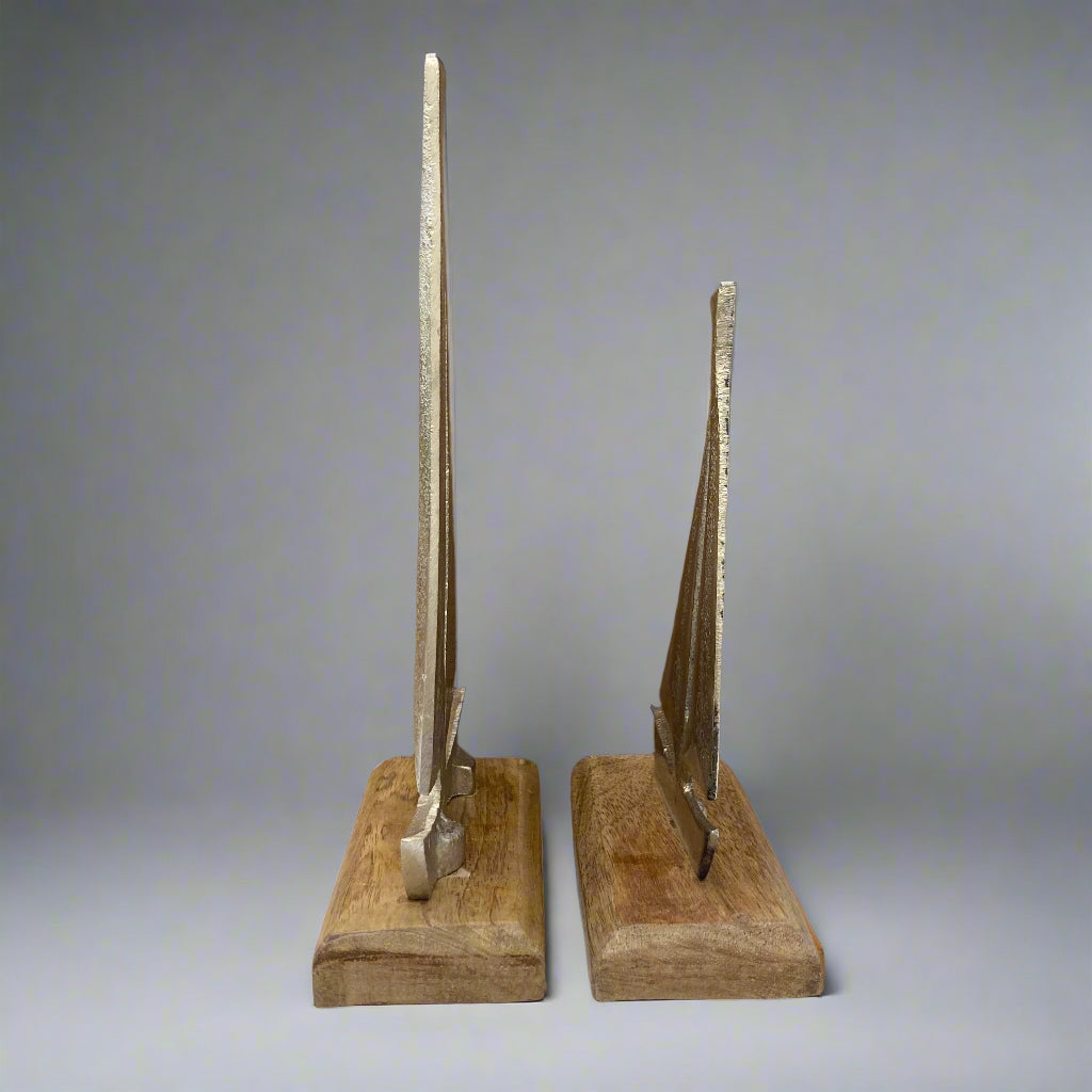 Cast aluminium sailing yachts on Mango wood base. 2 sizes available. Side on view.