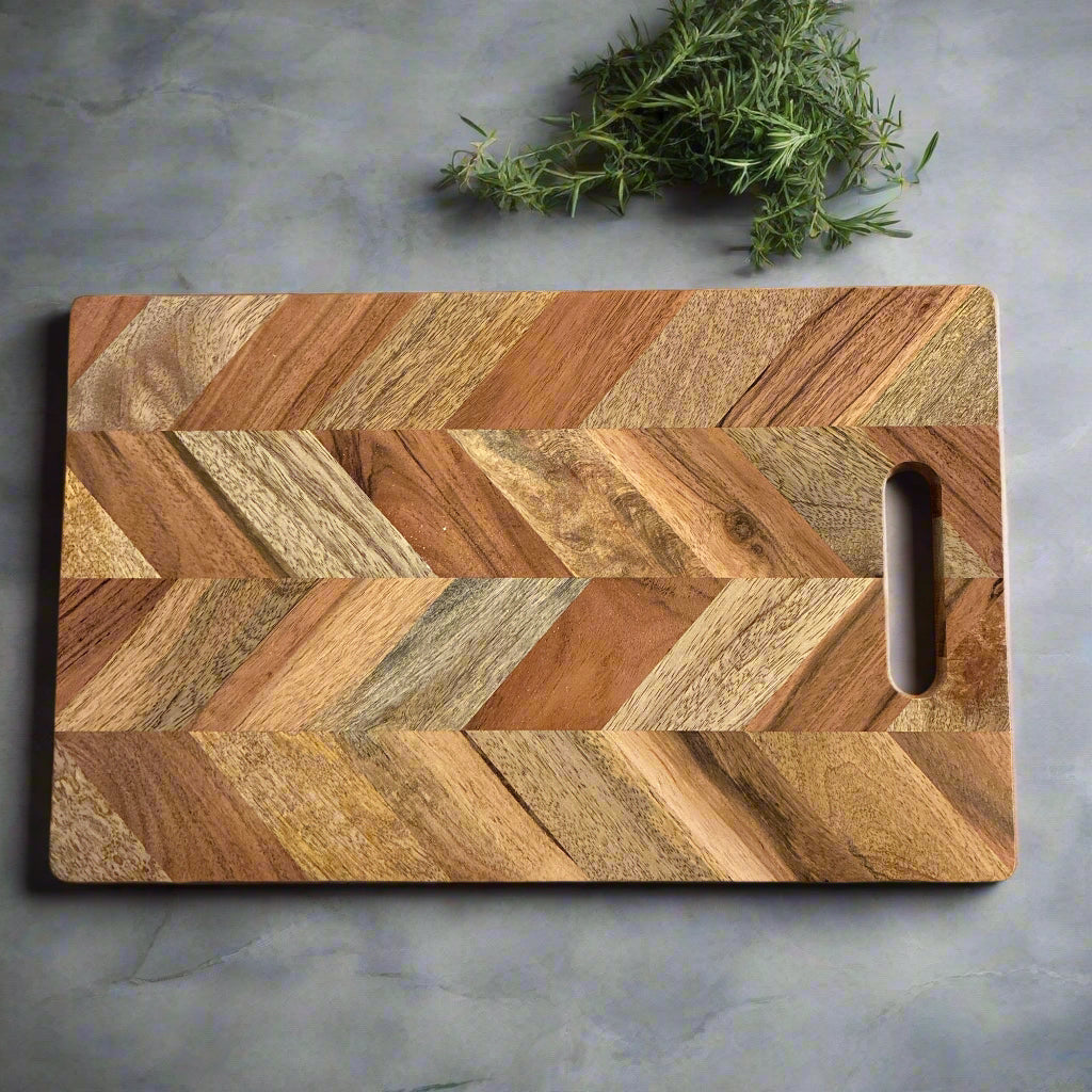 Wooden cutting board with a geometric pattern on a wooden surface