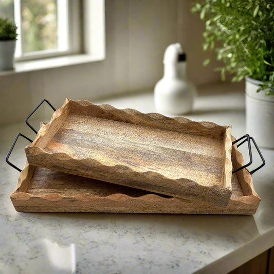 Wooden tray with metal handles on a wooden floor