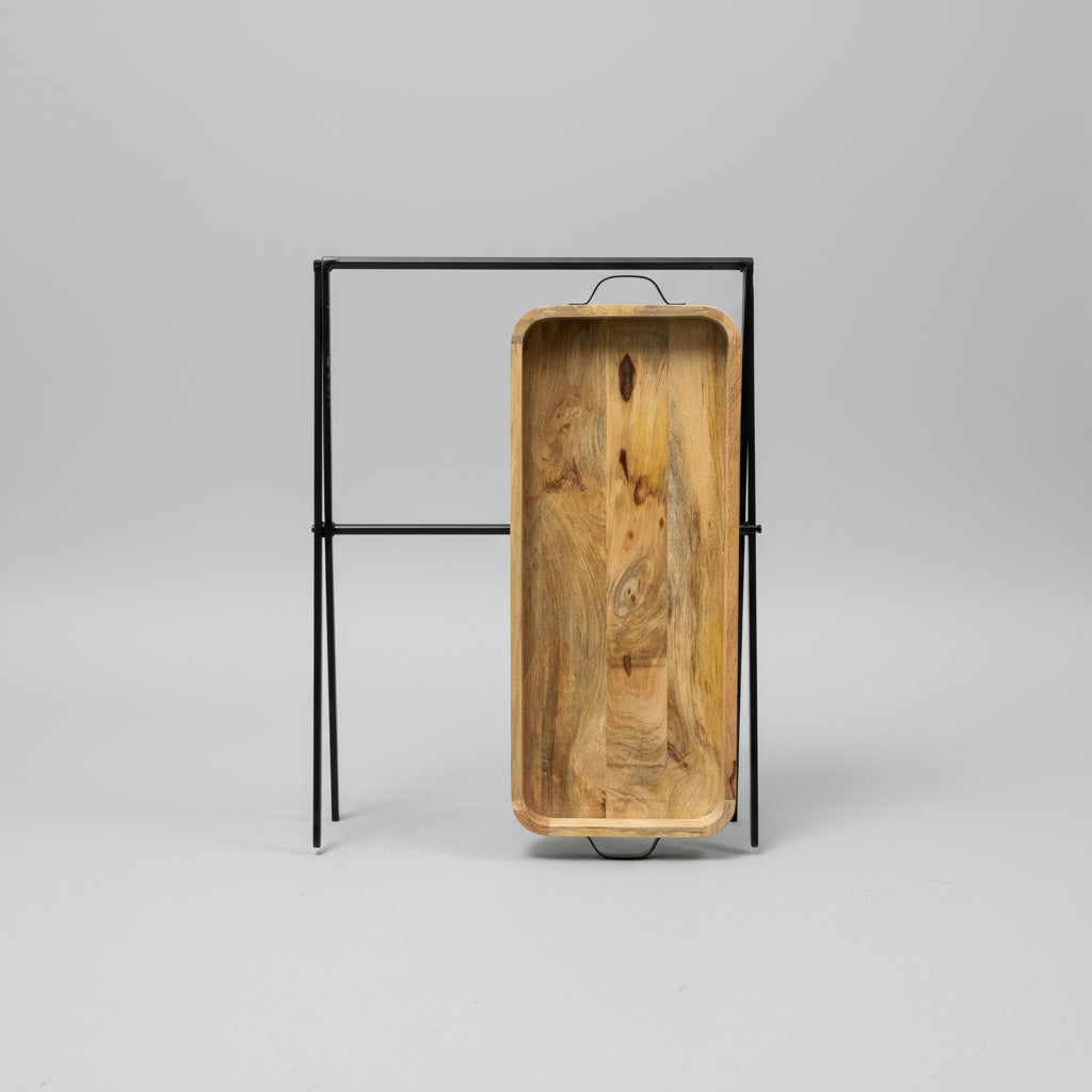 Wooden tray with metal frame on a warehouse floor with cardboard boxes in the background