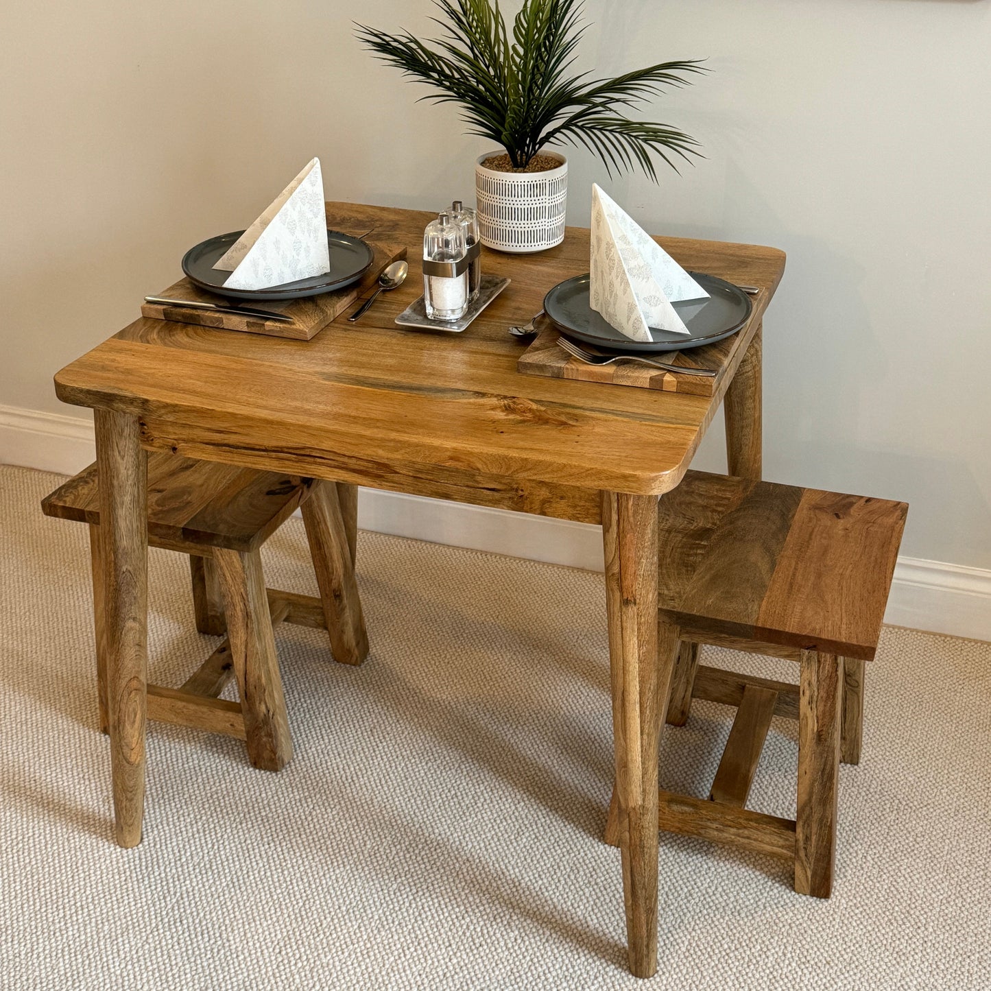80cm Square Mango dining table with cone shaped legs dressed with 2 settings