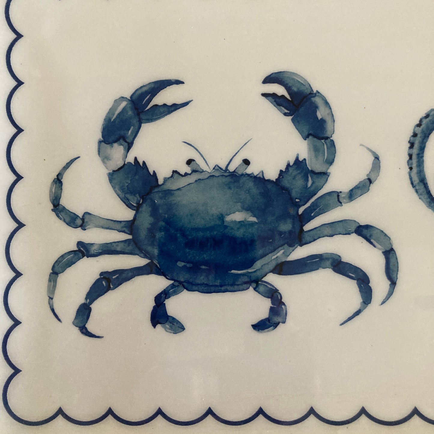 Blue crab design on a white background with blue border