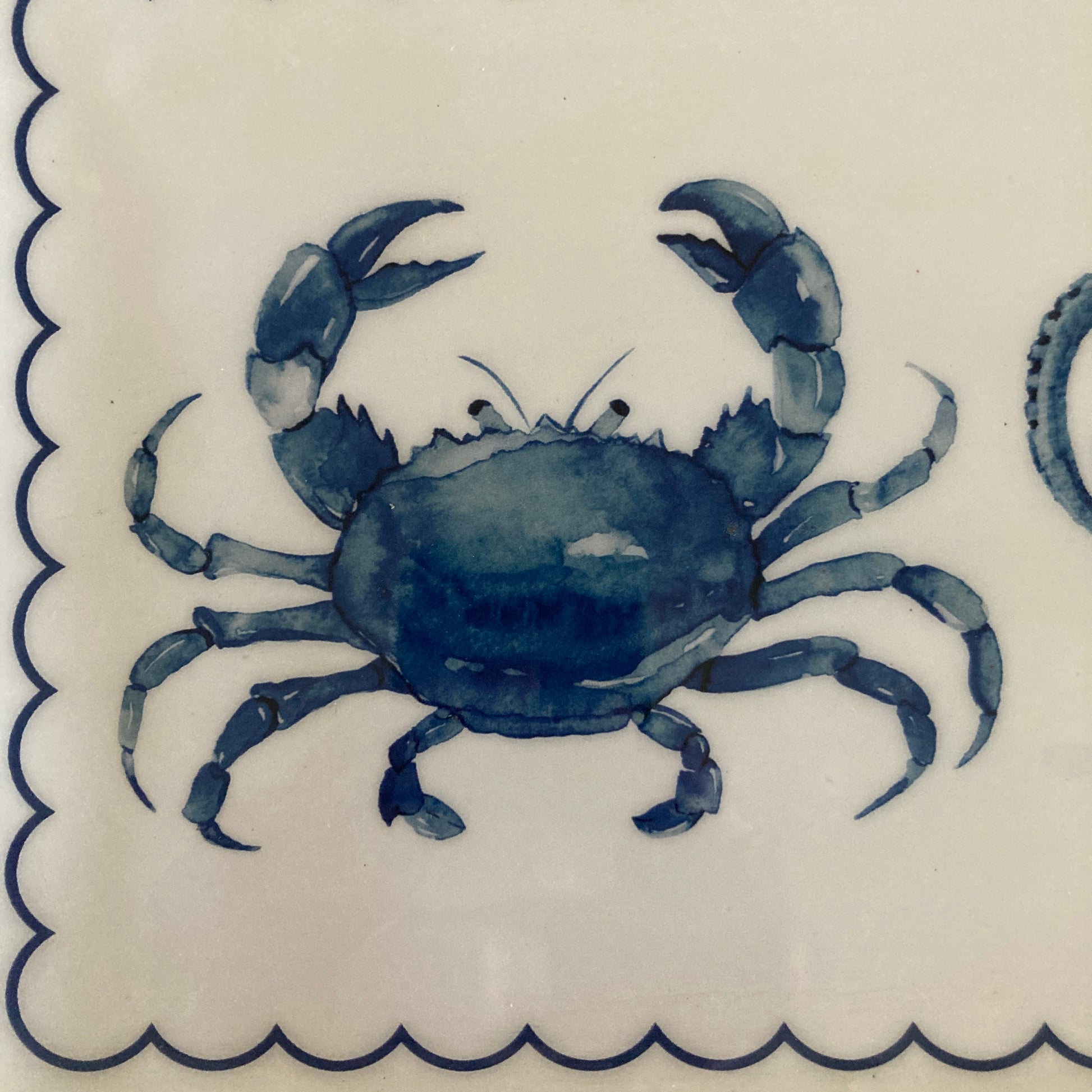 Blue crab design on a white background with blue border