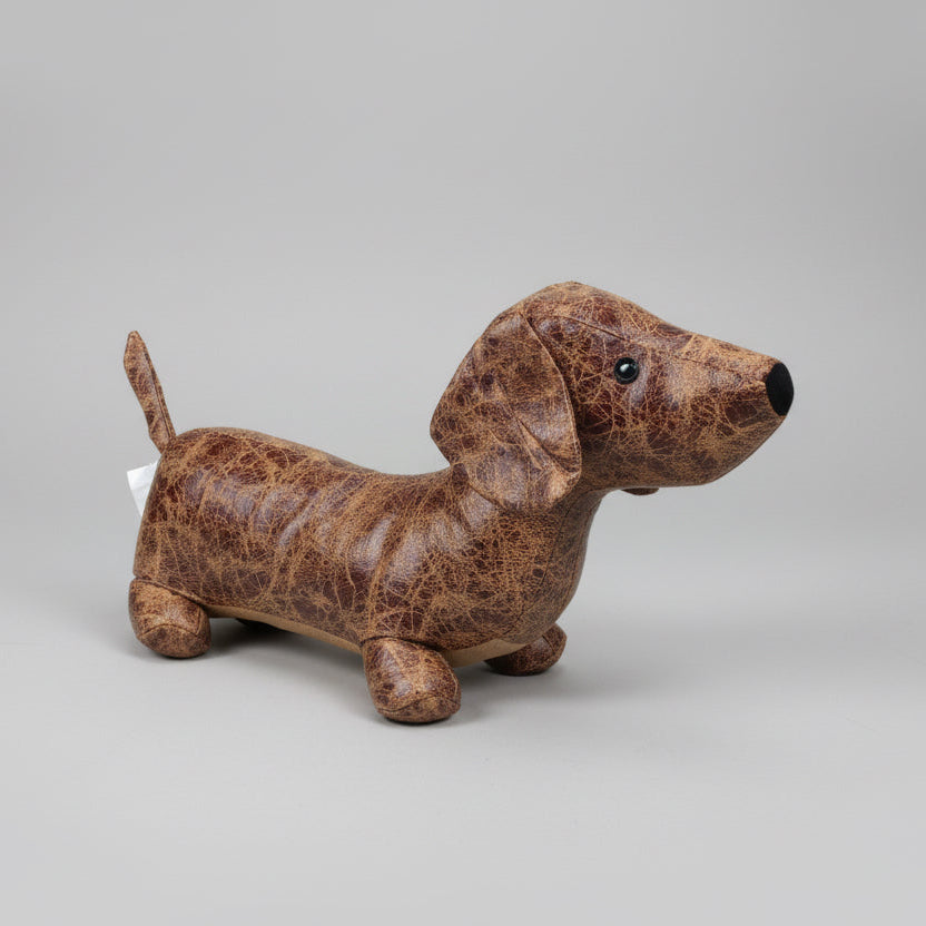 Daschund door stop. Cute sausage dog weighted faux leather doorstop.