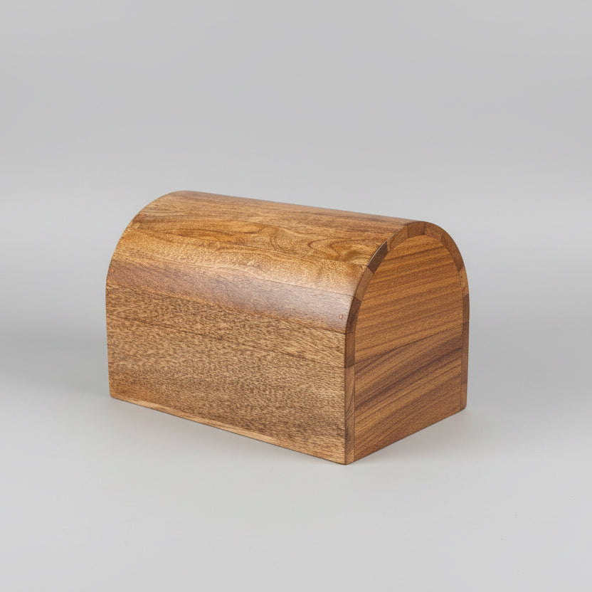 Wooden bread box on a kitchen counter