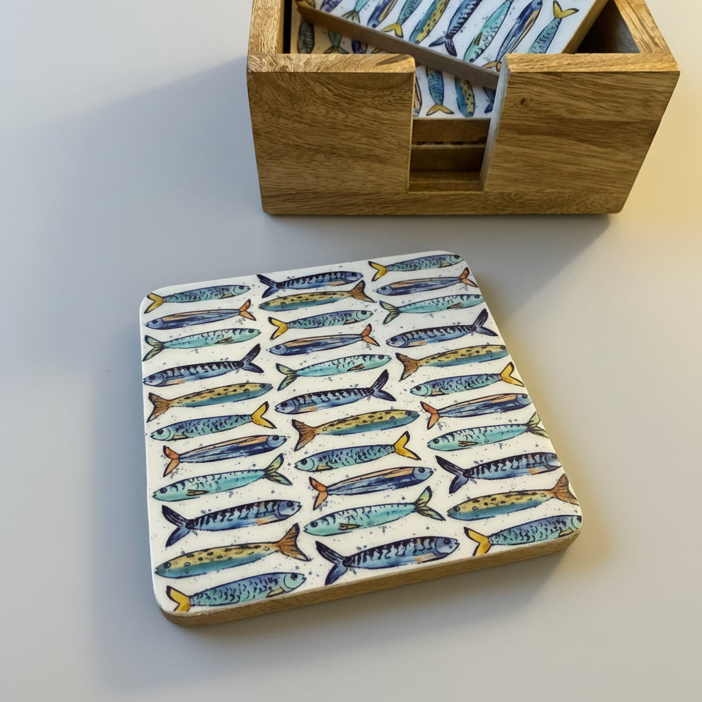 Coaster with fish pattern on a wooden surface