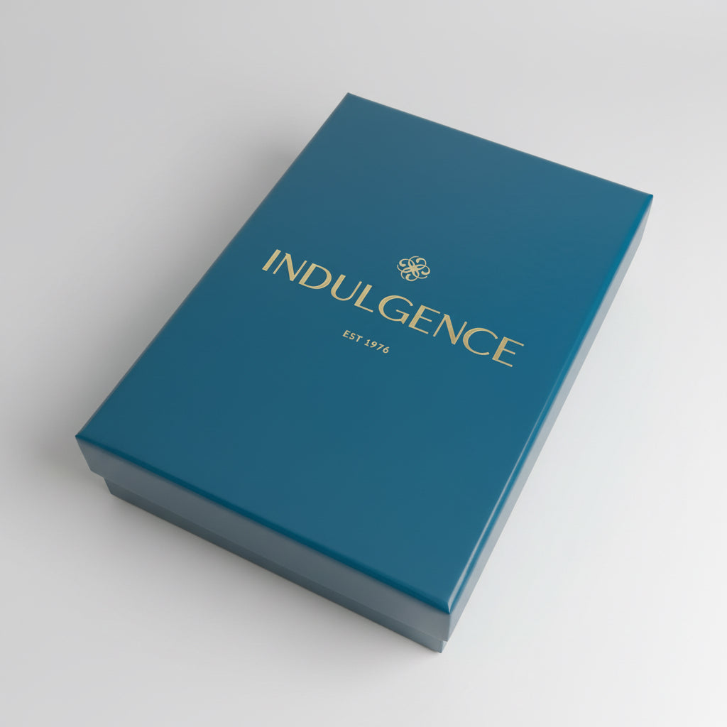 Blue box with 'Indulgence' branding on a textured surface