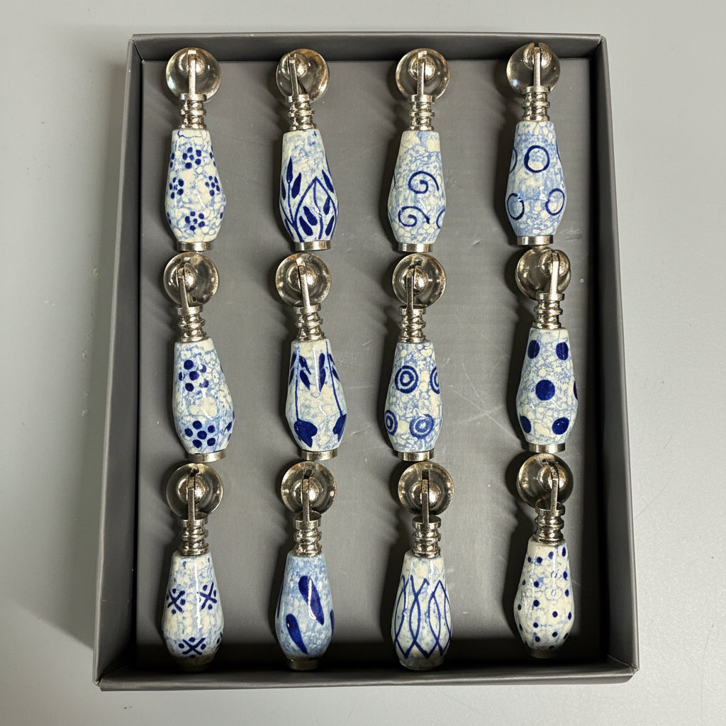 Set of decorative items with blue and white patterns in a box