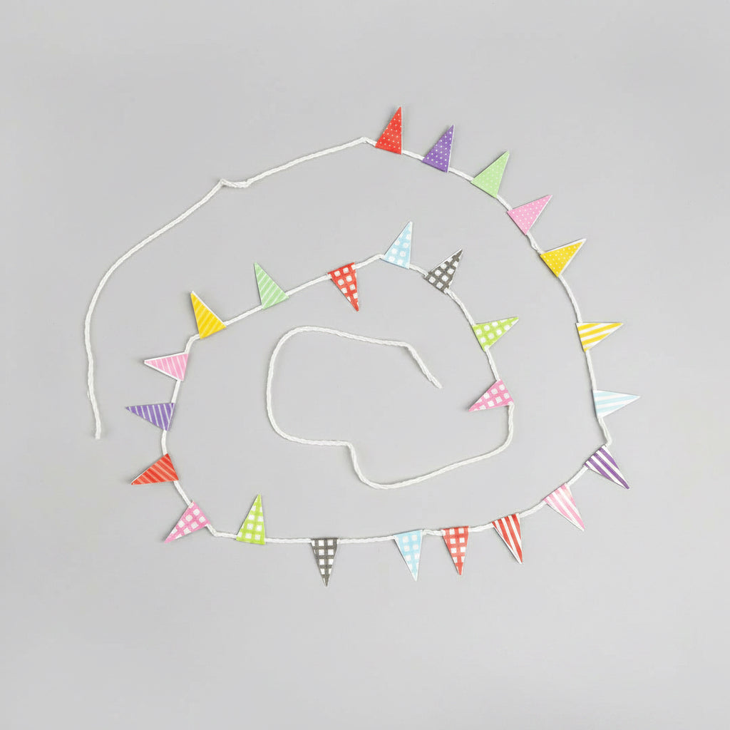 Decorative design on a black background with colorful triangular flags