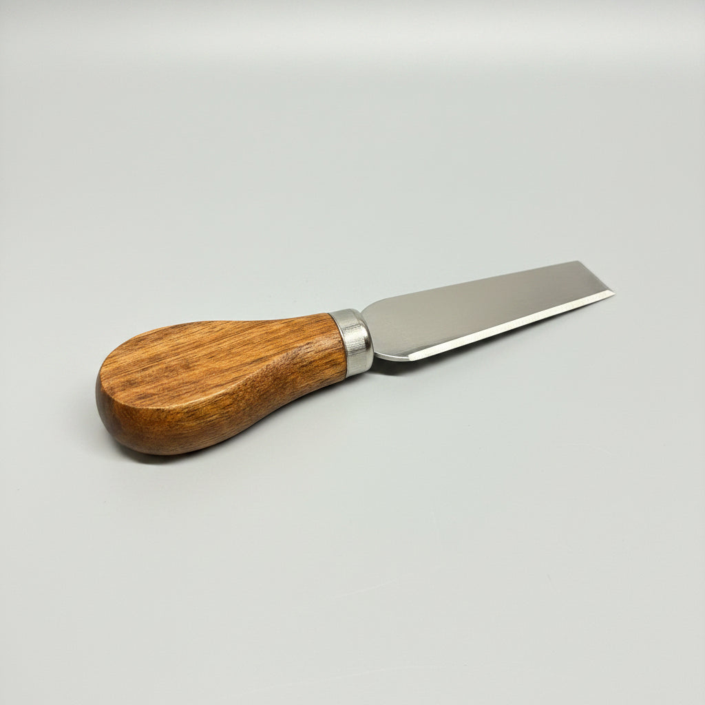 Wooden-handled knife with metal blade on a gray background