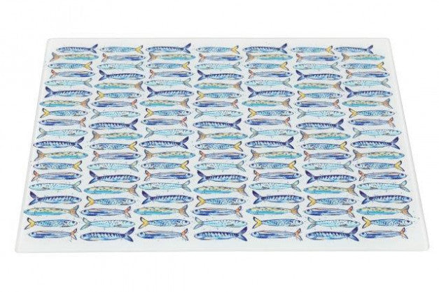A rectangular white placemat featuring a repeating pattern of blue and yellow mackerel fish, shown on a clean white background.