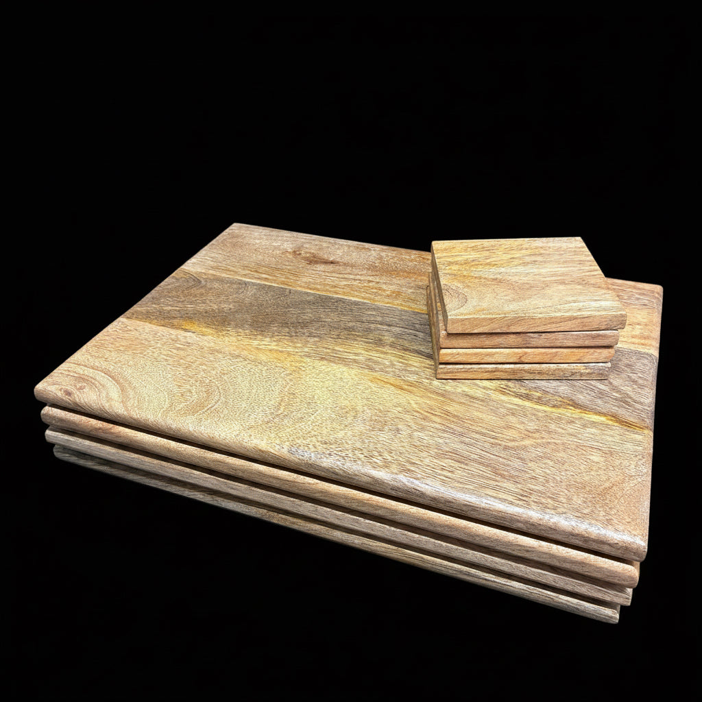 A set of rectangular wooden cutting boards with a natural grain pattern, including one larger board, one smaller board, and three coasters, shown floating against a dark gray background.