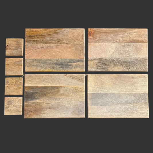 set of 4 rectangular Mango wood-placemats and coasters arranged on a dark background, showing natural grain patterns in tan, brown, beige, and gray tones.