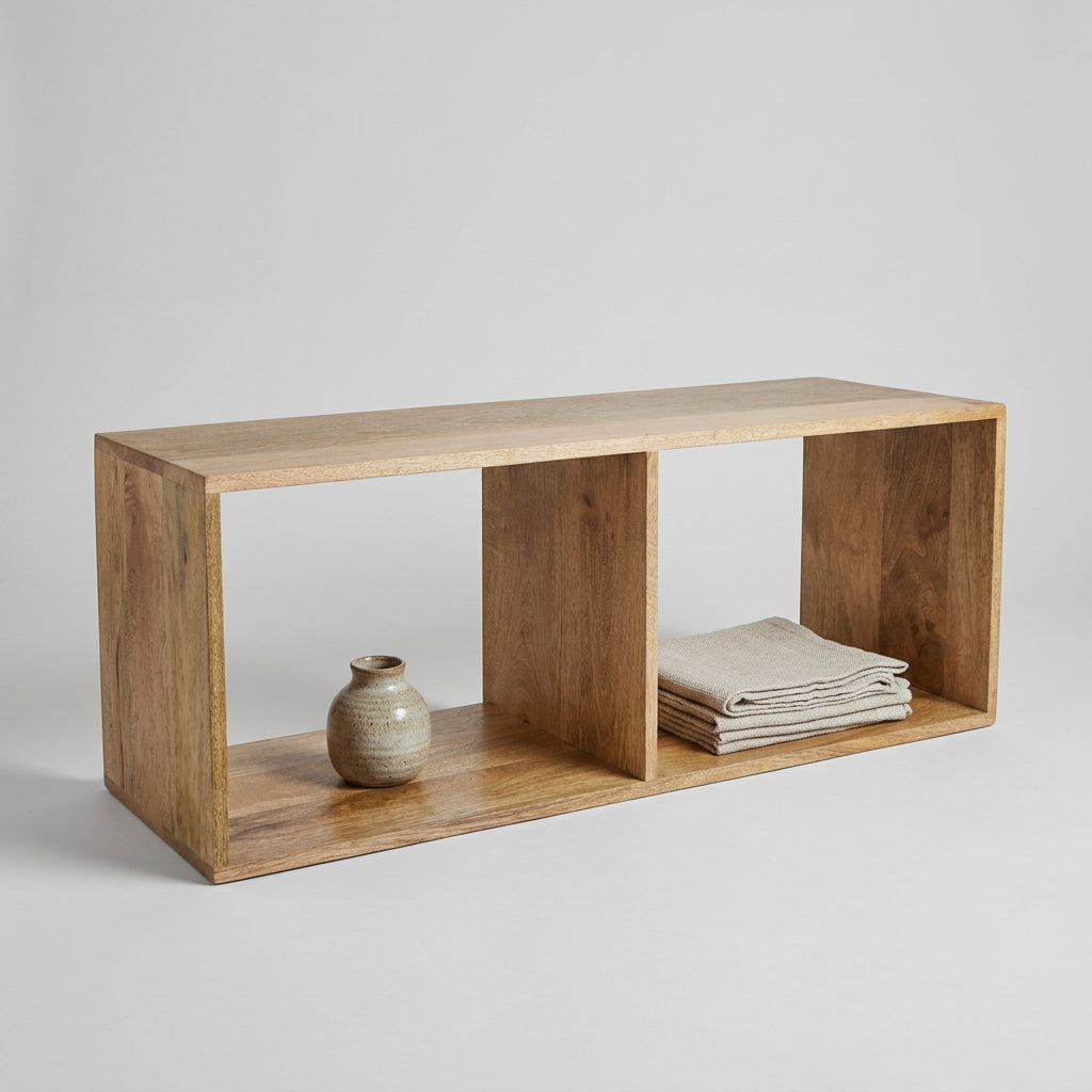 A rustic wooden open storage shelf with a two-tier design and a central back panel, shown in a workshop setting.