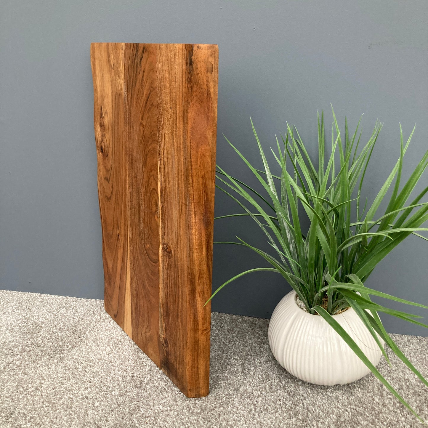 Chunky Acacia wood board with cut out grooves for easy handling 45 x 30cm stood up
