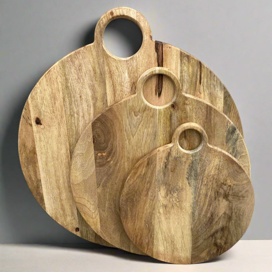 Round loop handled food boards made from solid Mango wood.