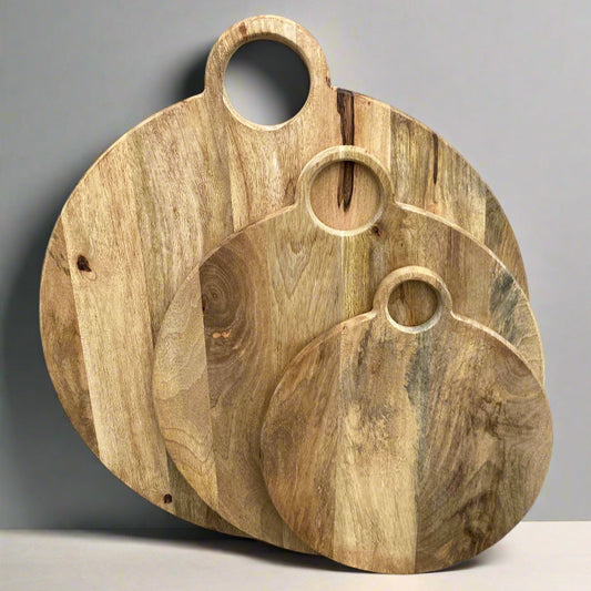 Round loop handled food boards made from solid Mango wood.