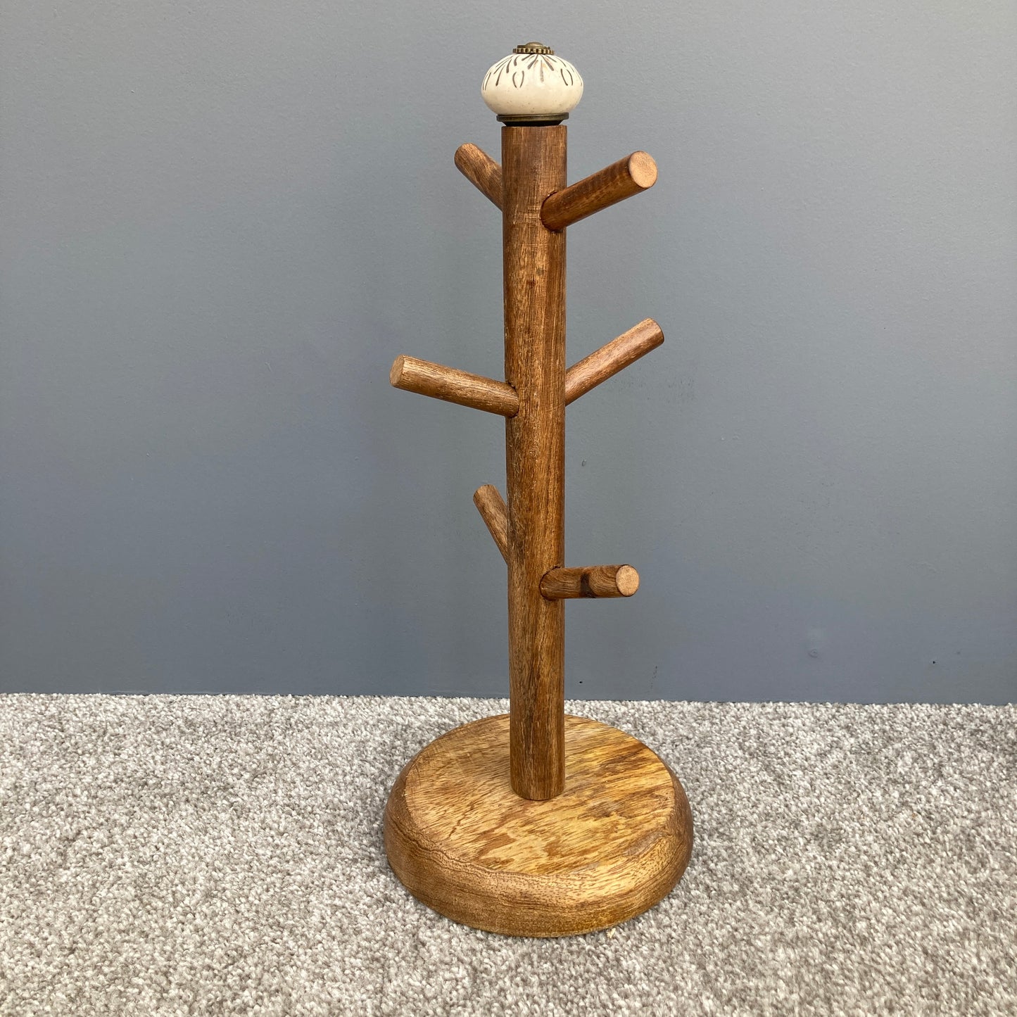 Dark Mango wood mug tree to hold up to 6 cups. 2 designs. One design shown.