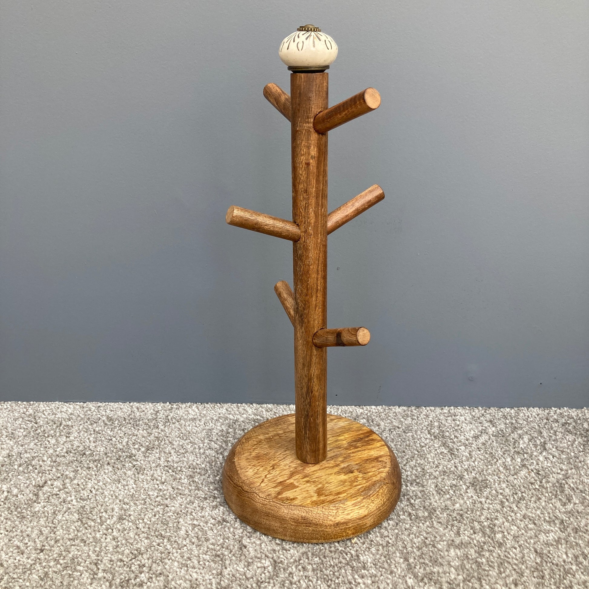 Dark Mango wood mug tree to hold up to 6 cups. 2 designs. One design shown.