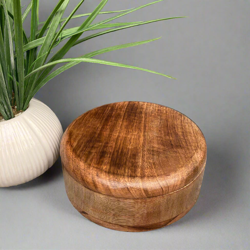 Dark Mango wood round lidded boxes. Large box