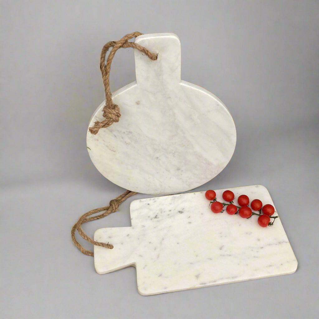 Marble chopping board - round or rectangular design. Both shown.