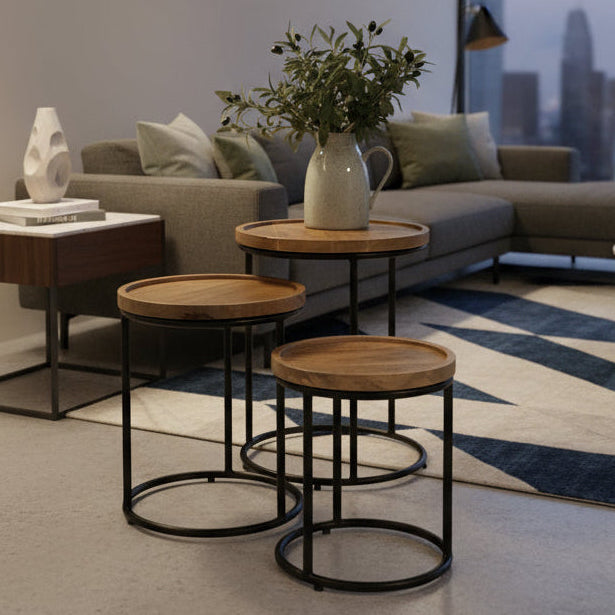 Industrial nest of 3 tables next to a side chair