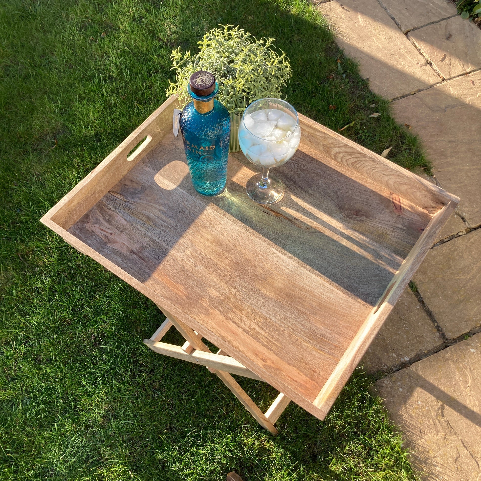 Sloping edge butler tray on foldable stand - Mango wood. From above.