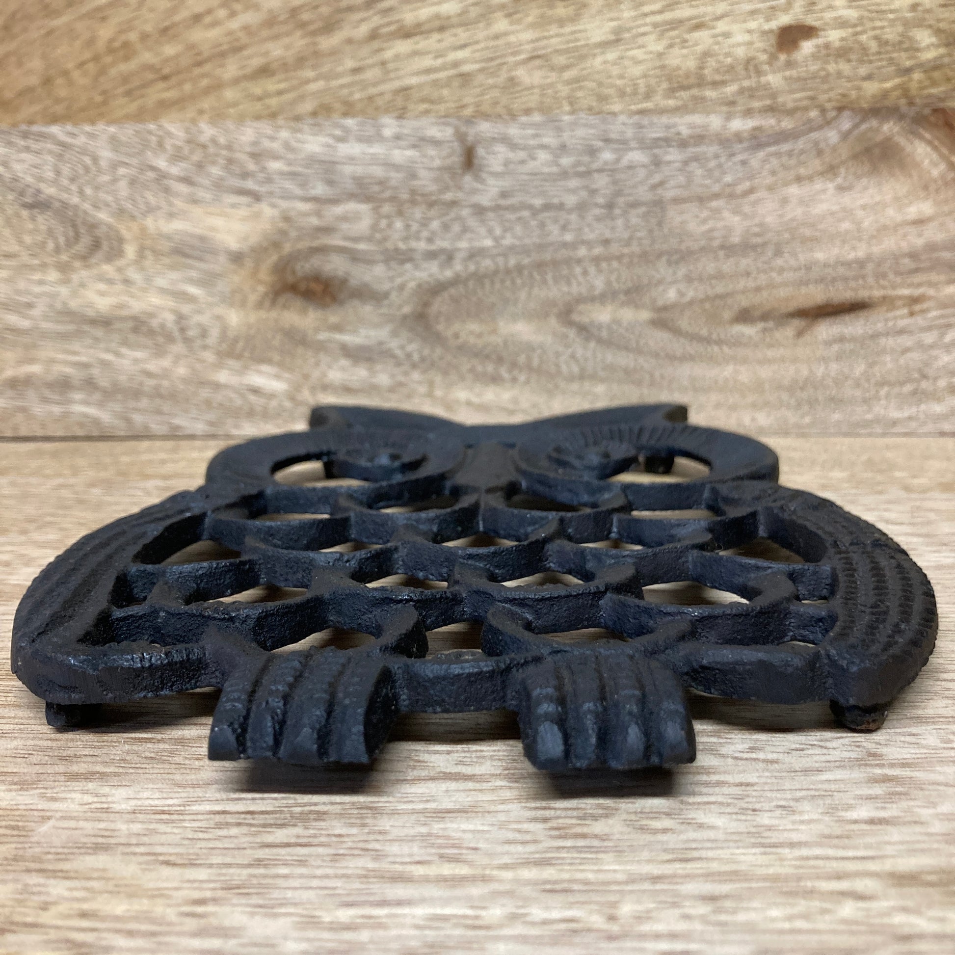 Black painted cast iron OWL design trivet / hotplate - laying down