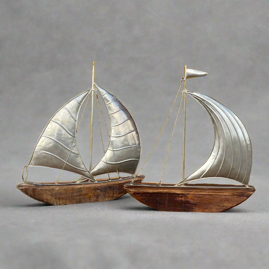 Large reclaimed rustic wood yachts with metal sail