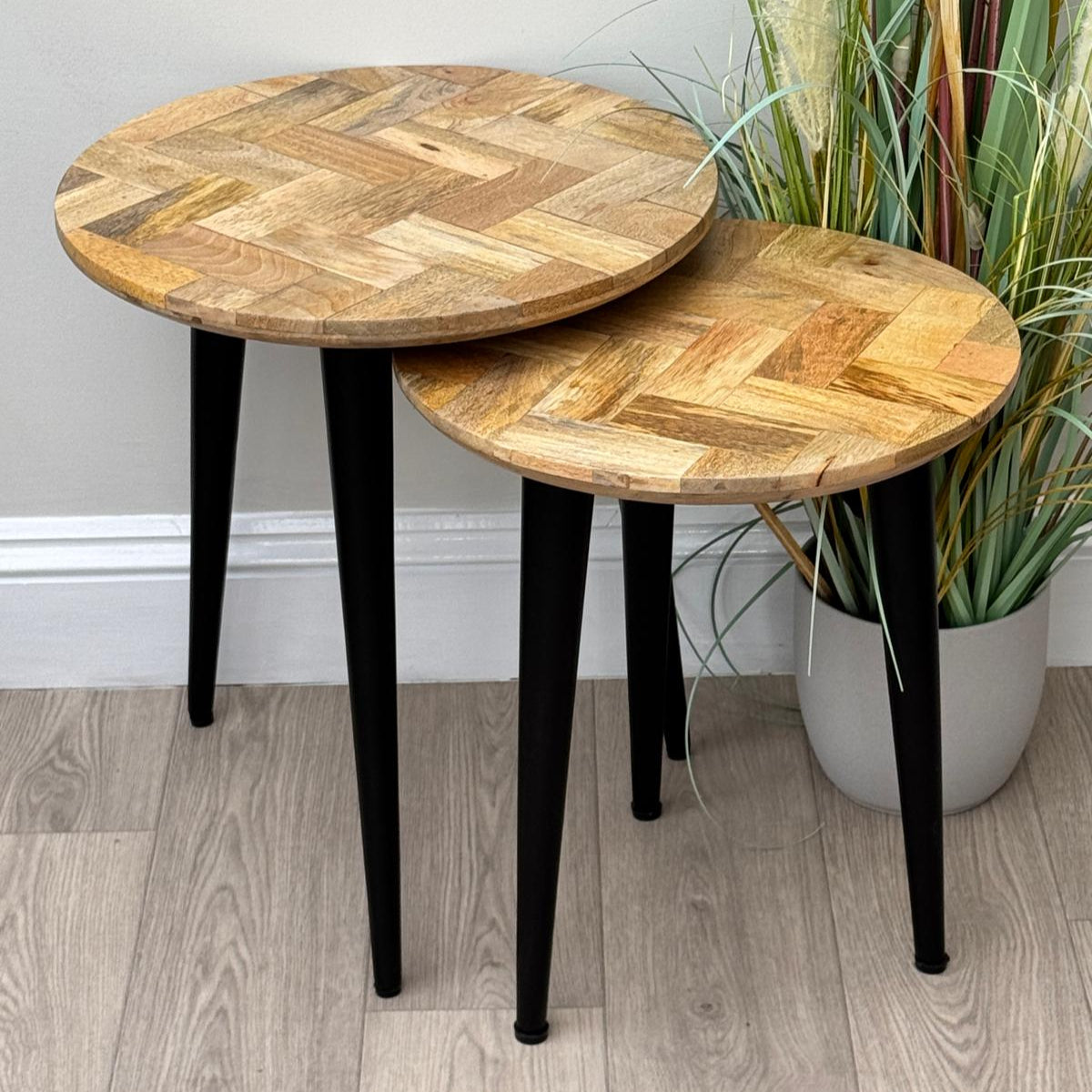 IMANT-002 Nest of 2 round Mango Parquet side tables, looking from above