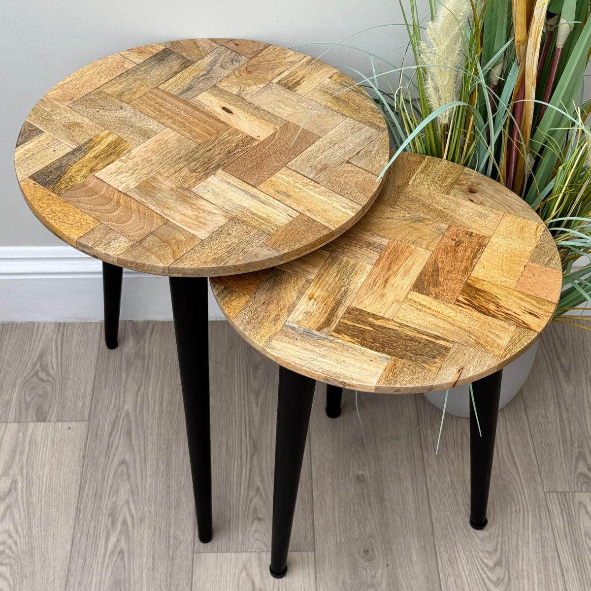 IMANT-002 Nest of 2 round Mango Parquet side tables from above