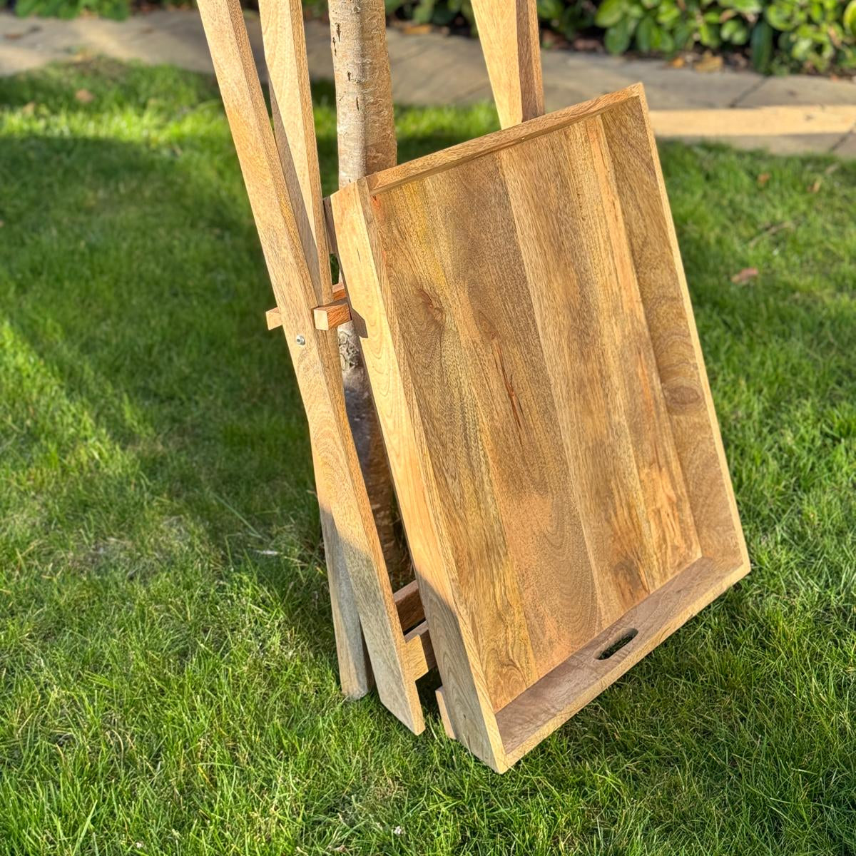 Sloping edge butler tray on foldable stand - Mango wood. Separated.
